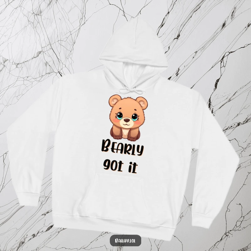 Funny bear cub hoodie featuring a curious cub with wide, simple eyes observing a tiny scale, offering cozy contemplation.